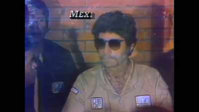 Wearing borrowed sunglasses
and a smile, - The Last Narc