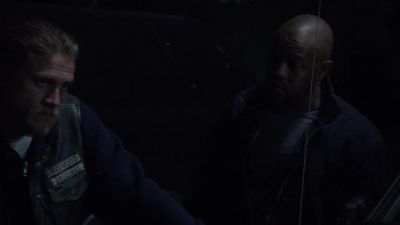 Wearing colors, carrying a weapon. - Sons of Anarchy