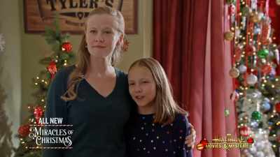 We'd like to sing
one of my dad's - Our Christmas Love Song