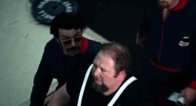 WEIGHT LIFTER:
No. Two-and-a... (panting) - Visions of Eight