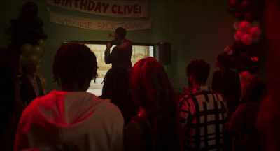 -"Welcome back, Travis!"
-[attendees cheering] - Pretty Red Dress