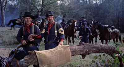 Well, at least that holy Joe ain't no kid. - The Horse Soldiers