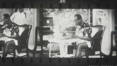 Well, I can't sit
at the tables out there." - Louis Armstrong's Black & Blues