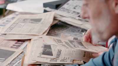 - Well, I was just thinking
about this newspaper here, - Wake Up Punk