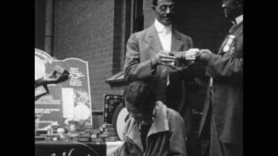 We'll keep
our dollars circulating - The Legacy of Black Wall Street