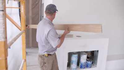 We're adding warmth
to this space by putting - Fixer Upper: Behind the Design