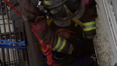 - We're going to lower
you down to our medics. - Chicago Fire