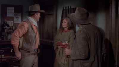 - What are you doing here?
- I couldn't stand waiting, not knowing. - Rio Lobo