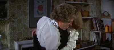 - What are you doing?
- Taking your coat off. - A Touch of Class