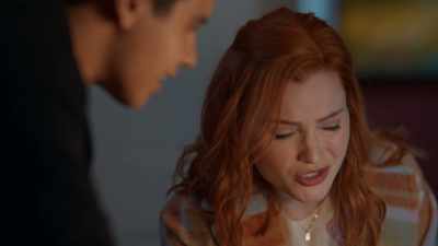 What does that look like to you?
An "SH"? - Aurora Teagarden Mysteries: Death at the Diner