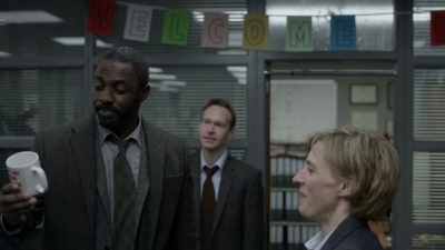 What does it say? "You don't have to
be mad to work here, but it helps." - Luther