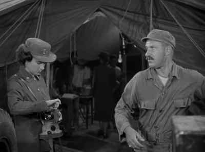 What exactly are your duties, sergeant?
- Keep the circus moving, ma'am. - Battle Circus