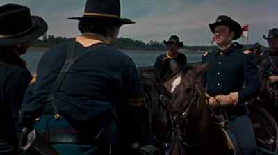 - What happened sergeant?
- Sioux major, they jumped us upriver. - Yellowstone Kelly
