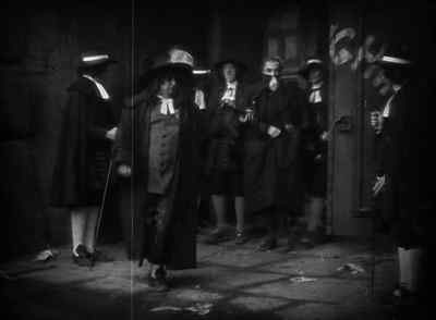 What is it?
- A musician. - The Man Who Laughs