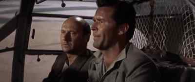 - What is it? Petrol?
- l don't know. We're losing power. - The Great Escape
