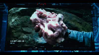 What is thatThat's her tracking implant She clawed it outHow would it Know to do thatShe remembered where they put it in - Jurassic World
