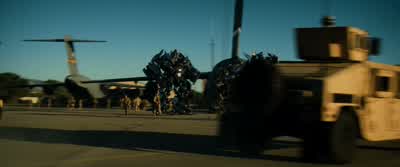 What is the meaning of thisYou dare point a gun at meYou want a piece of me I will tear you apart - Transformers: Revenge of the Fallen