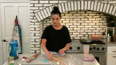 What we're gonna do is cut them all first - Selena + Chef