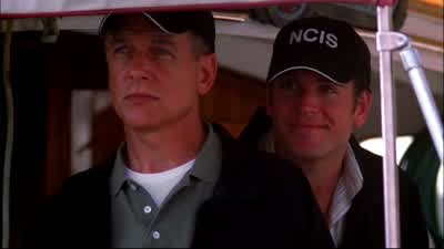 - What? - You got the time? - NCIS