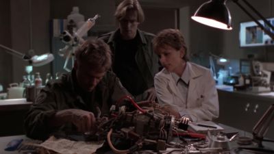 - What's he doing now?
- Building something. - Stargate SG-1