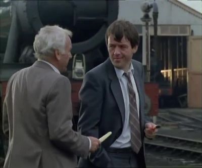 - What's he doing?
- Playing trains. - Inspector Morse