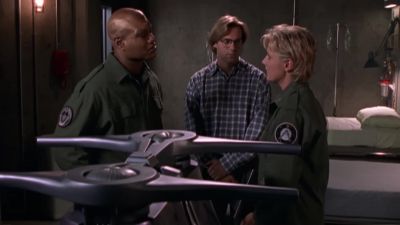 - What's going on, Captain?
- I may have a solution to this mess. - Stargate SG-1