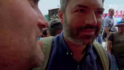 What's he saying?
He said, "Don't shoot." - From Russia to Iran: Crossing Wild Frontier