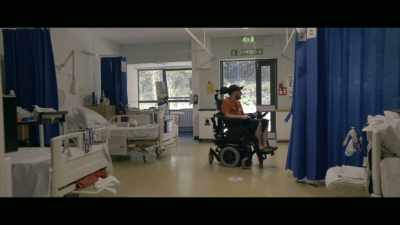 (wheelchair whirring) - David Holmes: The Boy Who Lived