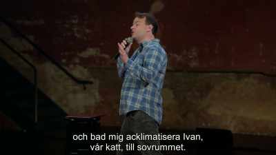 When we arrive, my wife has a headache, - Mike Birbiglia: Thank God for Jokes