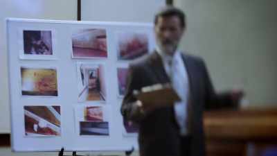 When Deaver mentions doing
a light test on the dark shirt - An American Murder Mystery: The Staircase