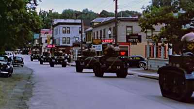 When Dockum's unit
parades through town, - The Pacific War in Color