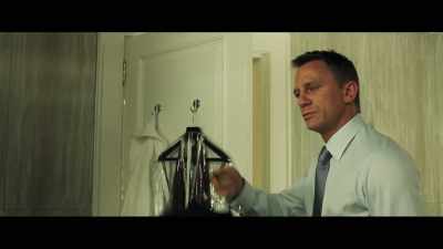 When he first puts on the tuxedo
in the bathroom... - The Sound of 007