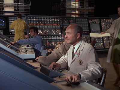 - Where are those photographs?
- Here they are, General. - The Time Tunnel