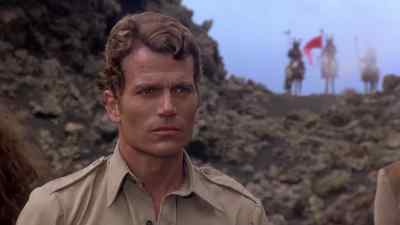 - Where's Ajor going?
- She's looking for the entrance to a cave. - The People That Time Forgot