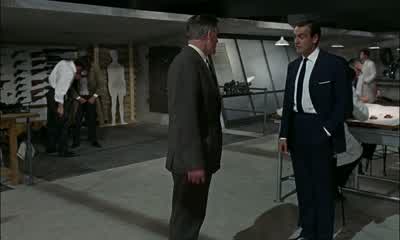 Where's my Bentley It's had its day I'm afraidBut it's never let me down M's orders 007You'll be using this Aston Martin DB5 with modificationsNow pay attention pleaseWindscreen bulletproof As are the side and the rear windowsRevolving number plates - Goldfinger