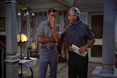 - Where's Lizzie?
- She's upstairs - The Rainmaker