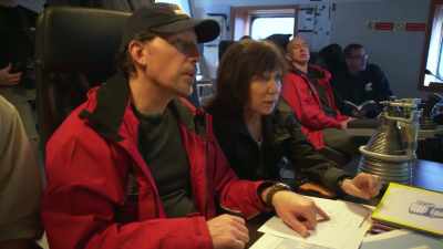 While Bezos watches
on a screen aboard ship, - Tales From The Explorers Club