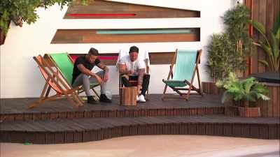 While one ex is sitting
upstairs ignoring him, - Love Island