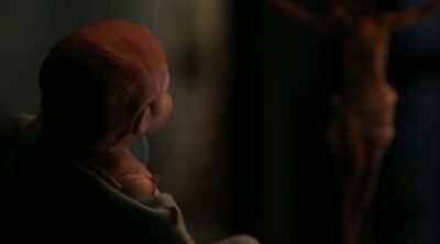 While Reverend Maginot
tends to Latoya, - Demon House