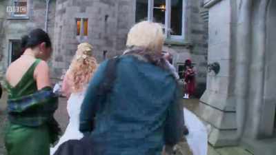While the bride
and groom say "I do," - The Mountain