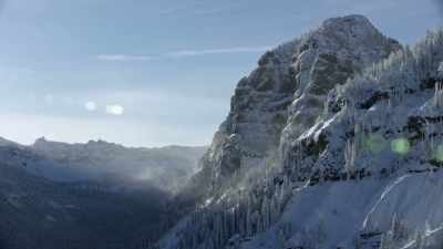While the otter family struggles
against the cold and snow, - Yellowstone: One-Fifty