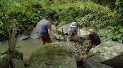 ‐ While the team prepares
to clear one of the large - Lost Gold of World War II