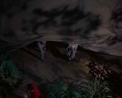 [ Whispering ]
Keep an eye on him. - Land of the Giants