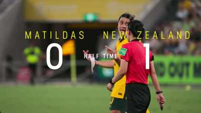 - (WHISTLE BLOWS)
- COMMENTATOR 1: Half-time in Townsville. - Matildas: The World at Our Feet