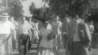 White rioters block black
students from attending school, - Black in Space: Breaking the Color Barrier