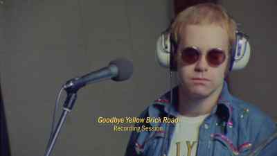 Who is he? - Elton John: Never Too Late