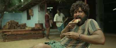 Who is that guy? Sitting cross legged? - Pushpa: The Rise