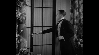 Who is the tall bloke alongside the mistress - The Last of Mrs  Cheyney