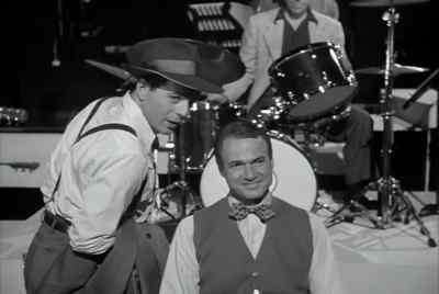 - Who's the canary?
- That's my wife, Rita. - Moonlighting
