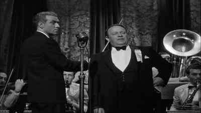 - Who's the dame?
- I don't know. Some newcomer. - City for Conquest